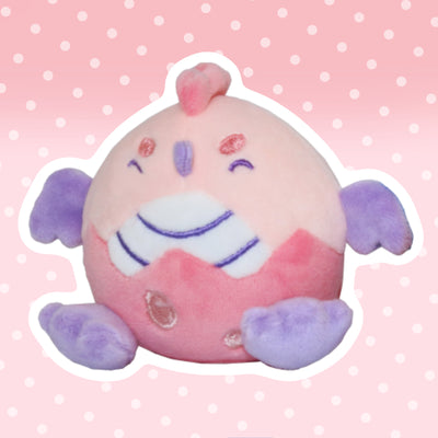 Colgante de peluche de basilisco diminuto